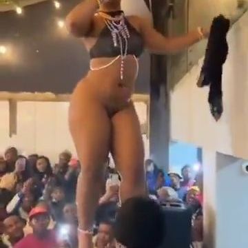 Female artist show off her nakedness on stage